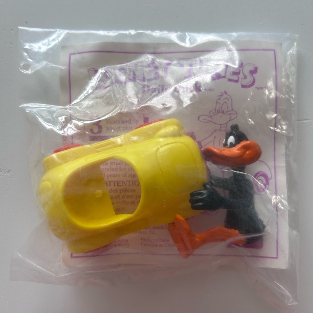 Warner Bros. Looney Tunes McDonald’s Yellow Toy Car with Daffy Duck 1989